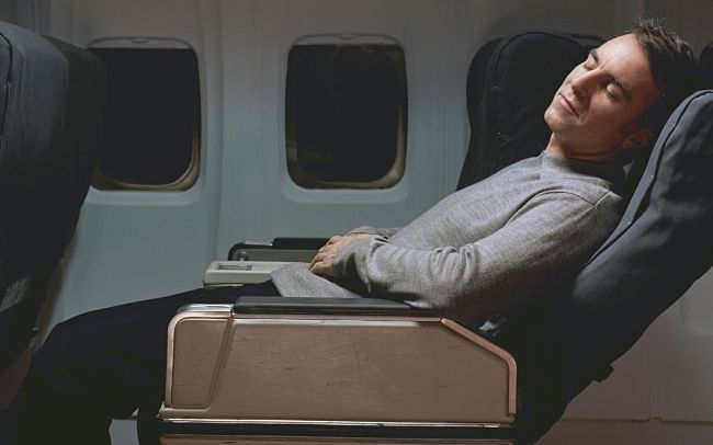 Business class with its extra room is easier for sleeping